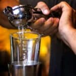 Pouring juice into clean glass